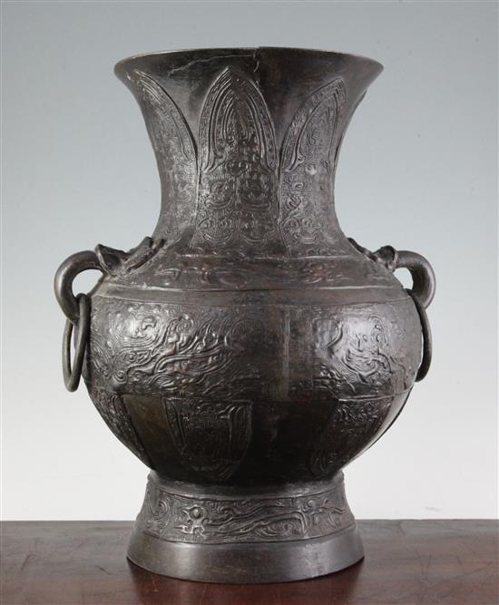 A large Chinese archaistic bronze vase, Hu, Ming dynasty, 38cm, old repairs